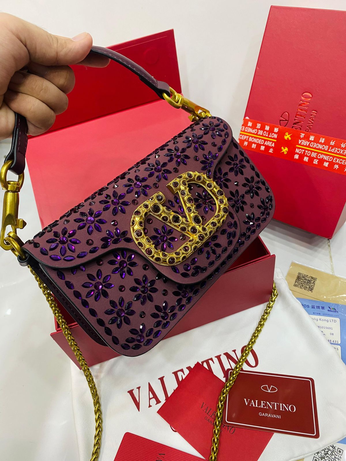 V Top Handle Clutch Bag