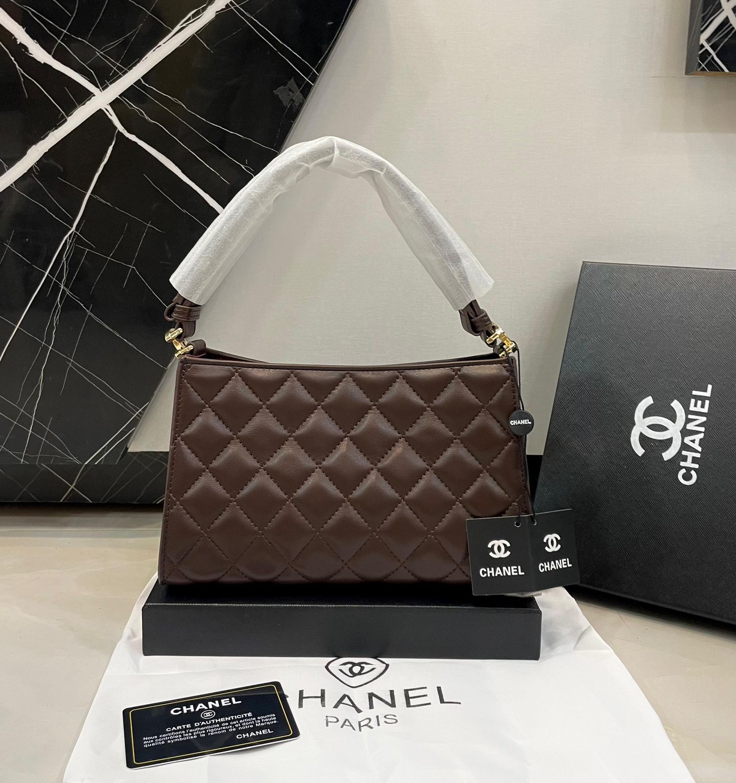 Cc Quilted Handbag