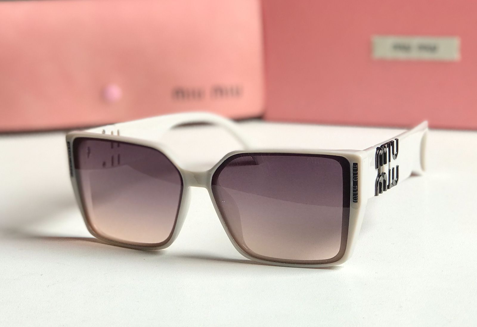 Miu Miu Harnes Glasses